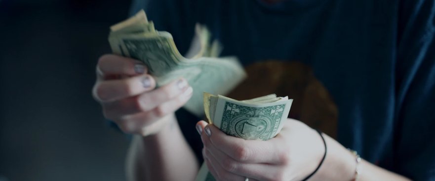 woman paying money